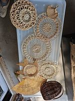 Group shot of all woven items laid out on tub lid