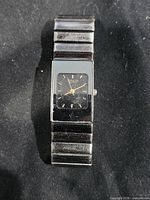Front view showing dial, case and bracelet