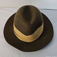 Top view of wool fedora hat showing crown and ribbon band