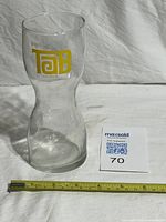 Front view of glass showing logo and shape