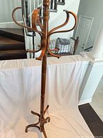 Full view of coat rack showing overall design and height