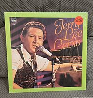 Front cover of Jerry Lee Lewis LP in shrink wrap showing track list and TeeVee Records logo