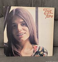 Front cover of Tret Fure self-titled LP sleeve showing artist portrait and title