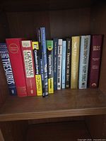 Full shelf view showing all hardcover books in lot