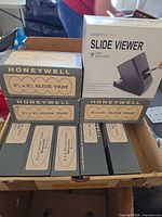 DigitNow slide viewer box with Honeywell 2½×2½ slide trays in shipping carton