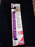 Front of packaged purple rhinestone cat collar