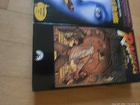 Front view showing both VHS slipcovers
