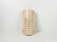 Front view of curved birch plywood slatted shade with mounting screws