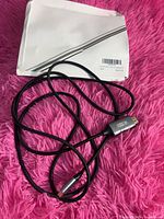 Full view of USB-C to HDMI cable coiled with packaging