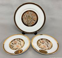 Group shot of three Chokin plates, large at back, two small front