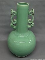 Full view of green glazed vase front