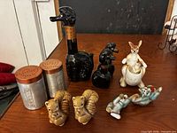 Group shot showing all assorted shakers and figurines on table