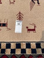 Close-up of rug surface, motifs and border detail