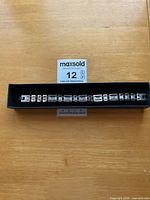 Bracelet in presentation box full length view
