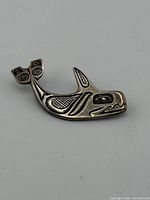 Front view of sterling whale brooch
