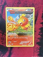 Full view of Torchic card front showing artwork, attacks and card number