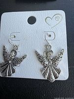 Front of card showing both angel earrings