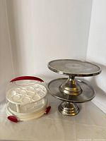 Cupcake carrier and two-tier cake stand side by side