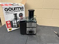 Juicer beside original box
