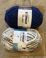 Front view of both Bernat yarn skeins with labels visible