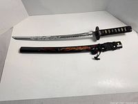 Katana and scabbard overall view