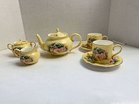 full tea set arranged showing all pieces and patterns