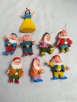 Full view of eight Disney character ornaments