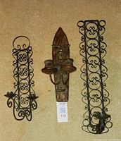 All three wall sconces side by side