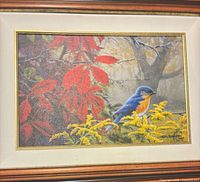 Full view of framed canvas print showing image, matting and wood frame
