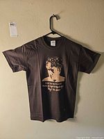 Full view of T-shirt on hanger