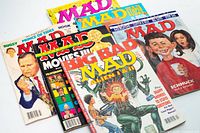 All six MAD magazines laid out front covers visible