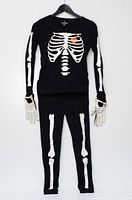 Full costume on hanger: shirt, pants, gloves showing white bone print