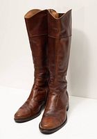 Three-quarter front view of both boots showing overall style and height