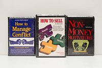 Front view of all three sealed cassette cases