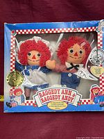 Full boxed set showing both dolls and packaging