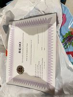 Front view of a blank Reiki certificate showing design and text layout