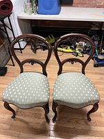 Front view pair of balloon-back chairs