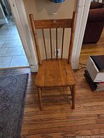 Front view of wooden Windsor chair