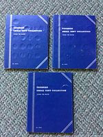 Three closed blue Whitman Canadian Small Cent Collection folders