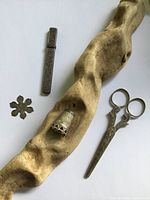 entire set displayed: scissors in sheath, needle case, thimble, floral fitting