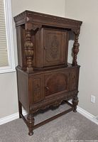 Full view of solid oak two-tier hutch showing overall form and finish