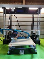 Front view showing overall printer structure, bed and extruder