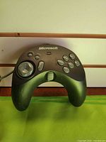 Front view of Microsoft SideWinder Freestyle Pro controller showing buttons and ergonomic shape