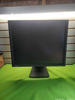 Front view of Samsung LCD monitor powered off on stand