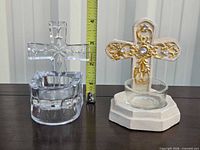 Front view of both cross votive holders with ruler for scale