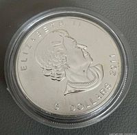 Obverse showing Queen Elizabeth II portrait, year 2011, face value 5 dollars