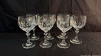 Seven Schott Zwiesel crystal goblets front view