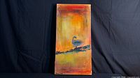 Full view of signed Sharon Tilden painting on black backdrop