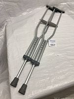 Full view of paired crutches showing overall condition and components