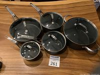 Top view of all five cookware pieces with lids on